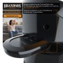 Brandson Turmventilator Silent Eco Green mit Fernbedienung und Display. Frau entspannt auf Sofa im Hintergrund.