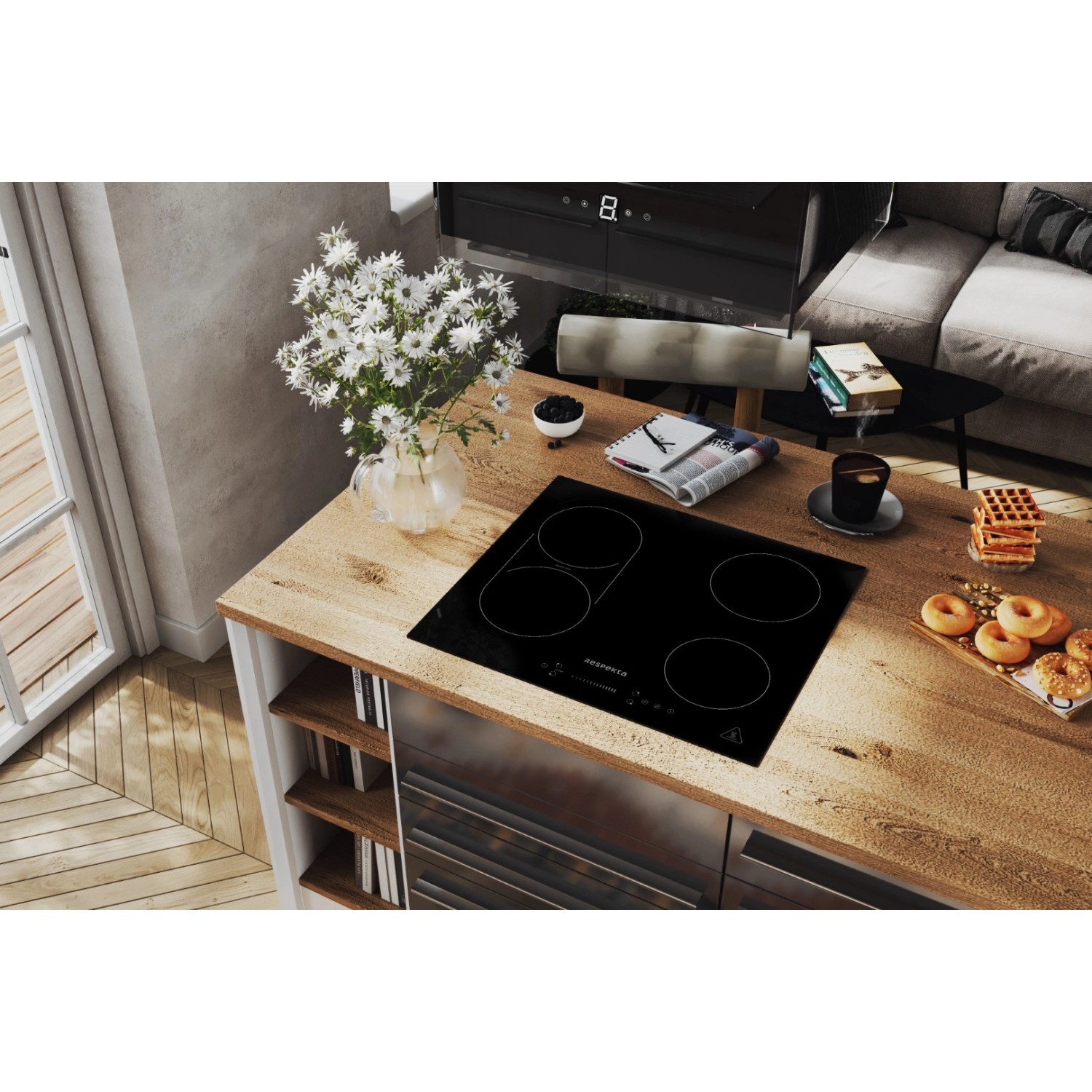 Respekta Induktionskochfeld auf einer Kücheninsel der Inselküche Gabriel. Glatte, schwarze Oberfläche mit vier Kochzonen.