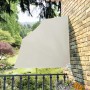 furnicato Faltbarer Balkonfächer in Creme, 140x140 cm, montiert an einer Backsteinmauer.