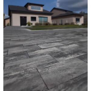 EHL Artano Terrassenplatten, 40x20 cm, grau-anthrazit, verlegt vor einem Haus.