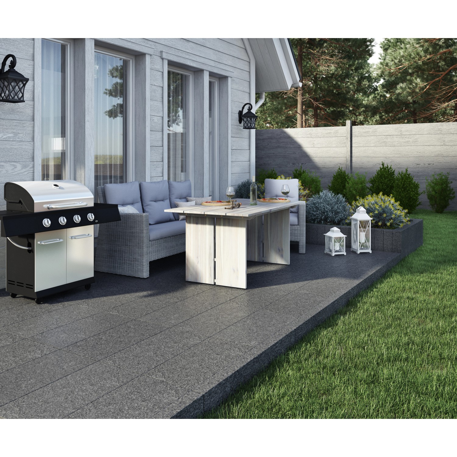 Anthrazit-graue Naturstein-Palisade (50x10x10 cm) als Beetbegrenzung im Garten.