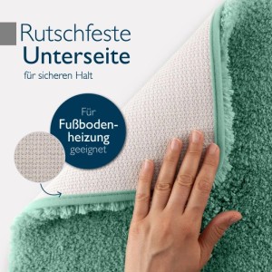 Mintgrüner Beautissu Badteppich BeauMare FL, rutschfeste Unterseite sichtbar, für Fußbodenheizung geeignet.