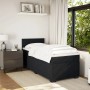 Schwarzes vidaXL Boxspringbett mit Matratze (100x200 cm) und Kopfteil im Schlafzimmer.