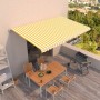 Manuell einziehbare Markise 500x300 cm in Gelb-Weiß gestreift, spendet Schatten auf Terrasse/Balkon.