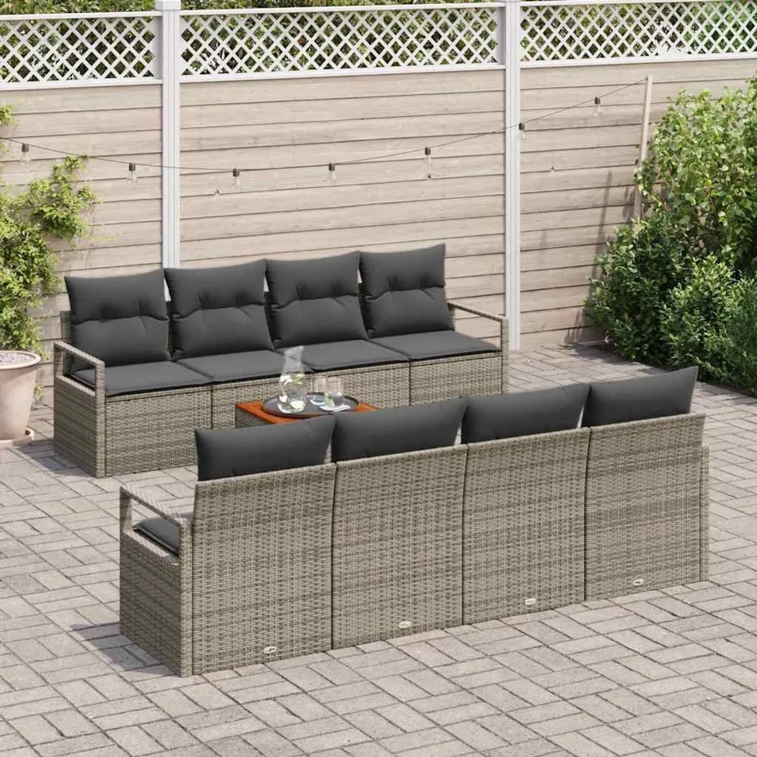 Graues 9-teiliges vidaXL Garten-Sofa-Set aus Rattan mit Tisch und grauen Kissen.