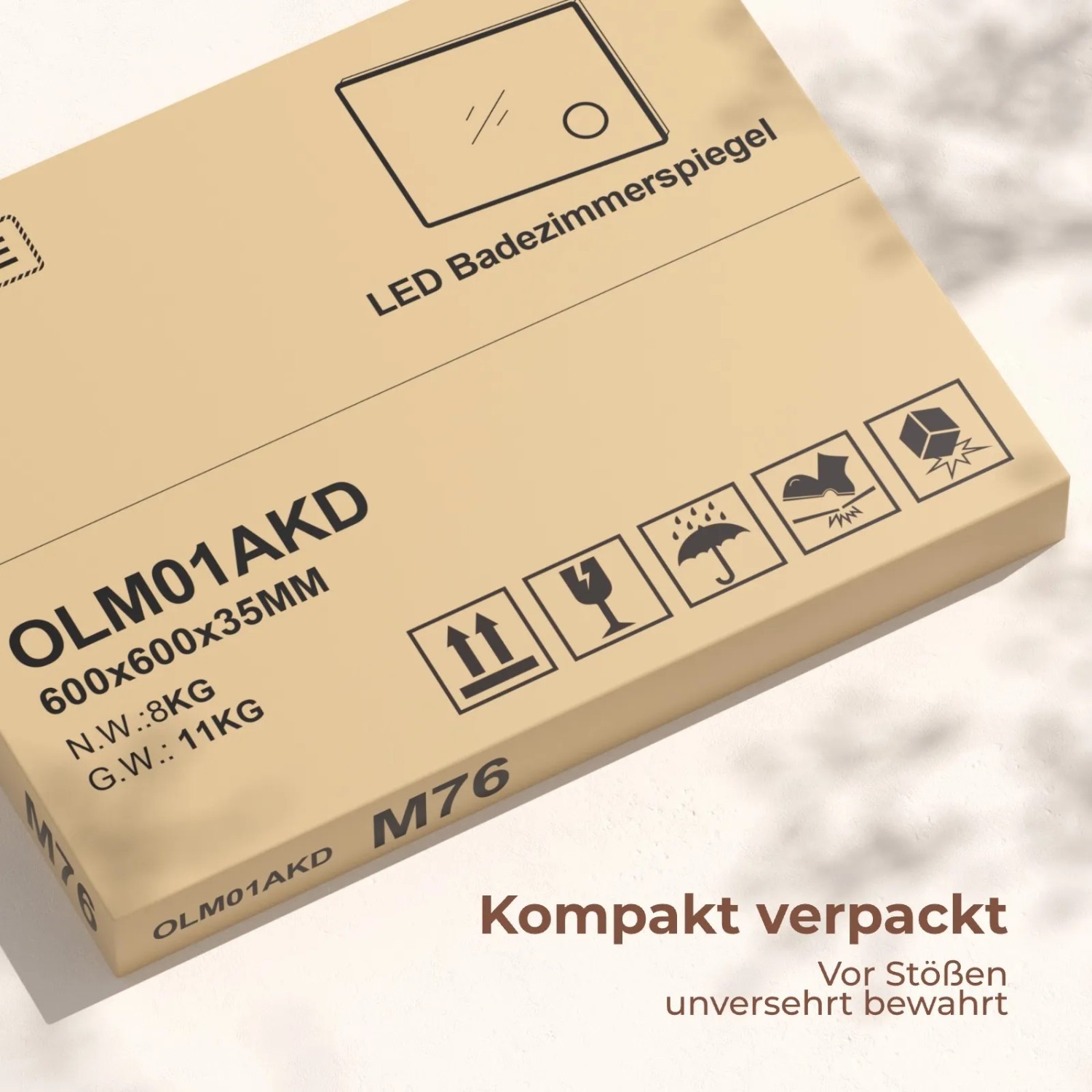 Verpackter Emke Badspiegel, rund, 60cm, mit LED-Beleuchtung. Kompakt und stoßsicher verpackt.