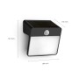 Schwarze Philips Yarixa Solar Wandleuchte mit Bewegungssensor und warmweißem Licht.