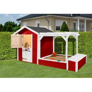 Weka Spielhaus Drachenhöhle Tabaluga rot-weiß mit Sandkasten und Pergola, Kind schaut aus dem Fenster.