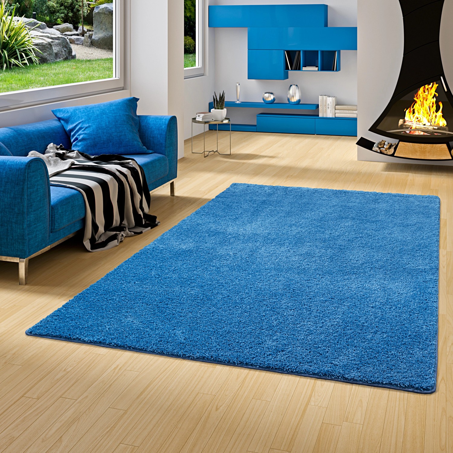 Blauer Snapstyle Hochflor Teppich Palace (100x300cm) im Wohnzimmer.