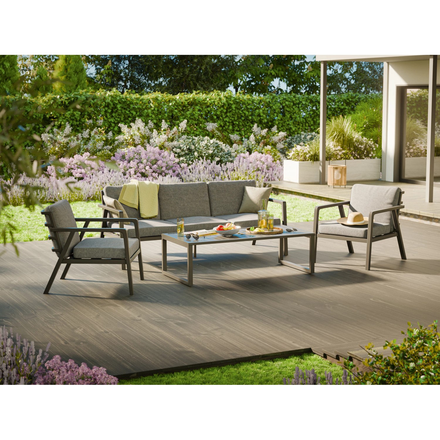 4-teilige Lounge- und Esstischgruppe Tamworth in Anthrazit-Grau mit Aluminiumgestell und grauen Kissen.