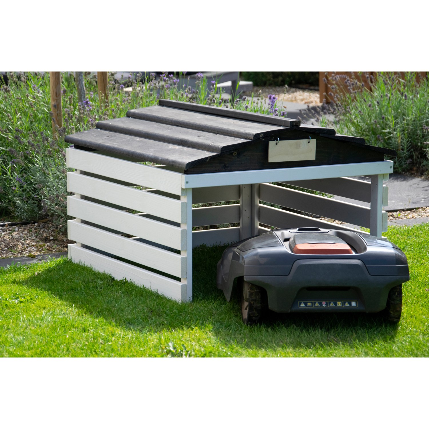 Dobar Mährobotergarage mit schwarz-weißem Design und abnehmbarem Dach. Mähroboter steht in der Garage.