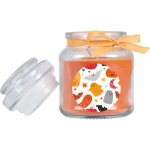Orangefarbene Duftkerze im Glas mit Halloween-Motiv und Schleife, Brenndauer 30h.