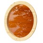 Rundes Karibu Saunafenster mit Klarglas und naturbelassenem Holzrahmen.