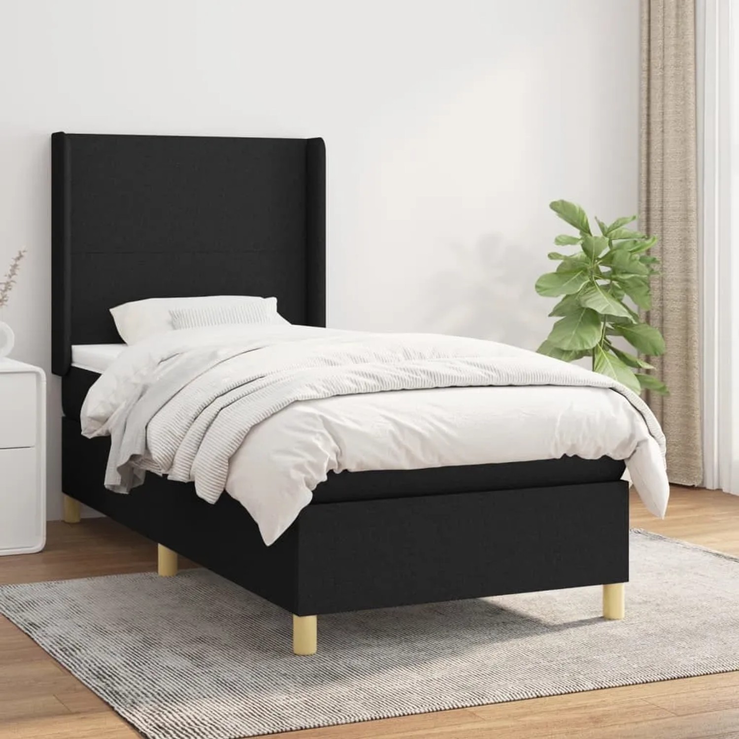 Schwarzes vidaXL Boxspringbett (90x190 cm) mit Matratze und hohem Kopfteil.