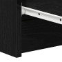Detailaufnahme: Schwarzes Sideboard in Eichen-Optik mit Schubladenschiene.