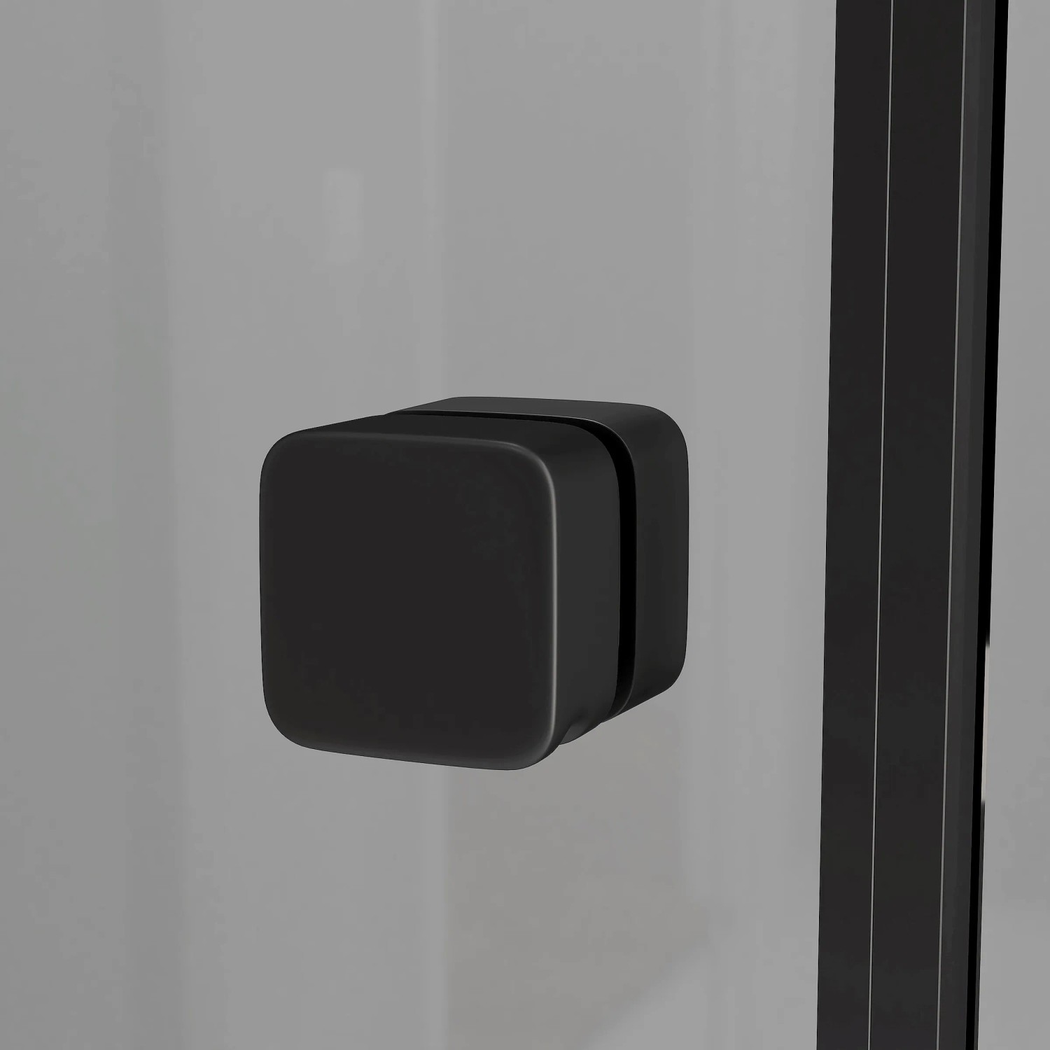 Detailaufnahme: Mattschwarzer Türgriff der Aurlane Komplettdusche Grey Touch.