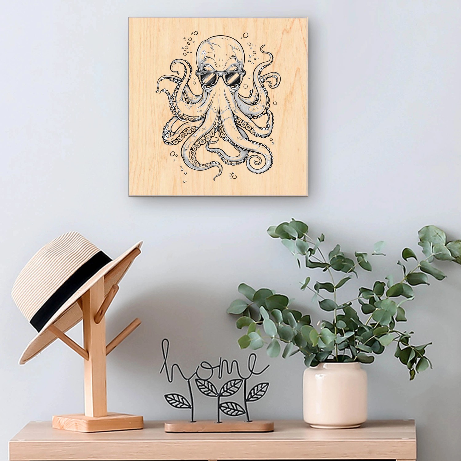 Schwarzer Schlüsselkasten aus Holz (30x30cm) mit Oktopus-Motiv und 50 Haken zur Schlüsselaufbewahrung.