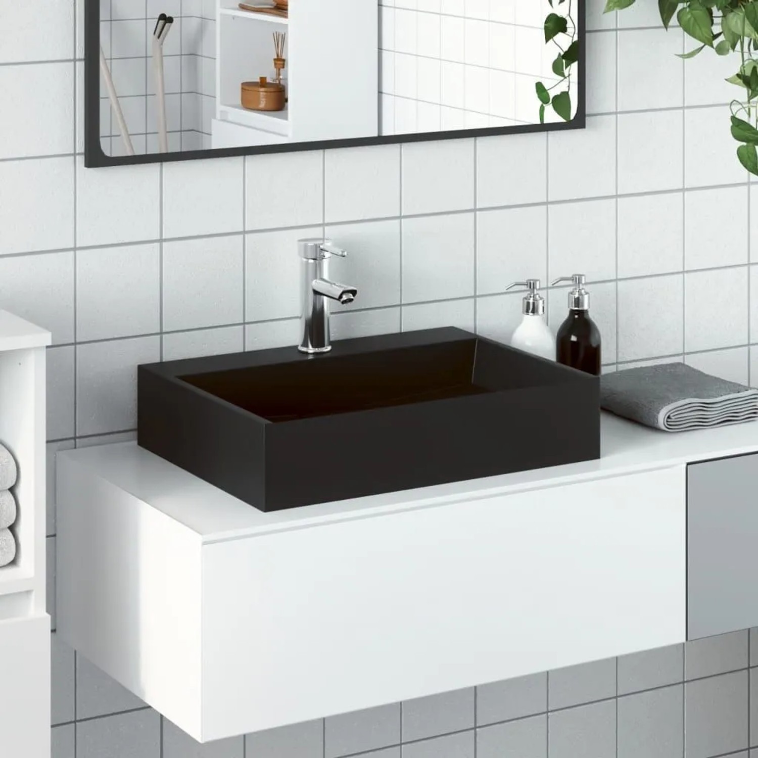 Rechteckiges, mattschwarzes vidaXL Waschbecken aus Mineralguss auf einem weißen Waschtisch.
