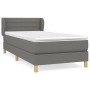 Dunkelgraues Boxspringbett 90x190 cm mit Matratze und Kopfteil.