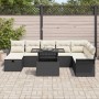 Schwarzes 9-teiliges Garten-Sofa-Set aus Poly Rattan mit Tisch und beigen Kissen.