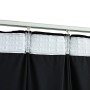 Schwarzer vidaXL Verdunkelungsvorhang aus Samt mit Haken, 290x245 cm, an einer Gardinenstange.