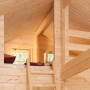 Innenansicht Holz-Gartenhaus mit Satteldach, naturbelassen und unbehandelt, mit Leiter zum Schlafboden.