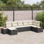Schwarzes 7-teiliges vidaXL Garten-Sofa-Set aus Poly Rattan mit Kissen.