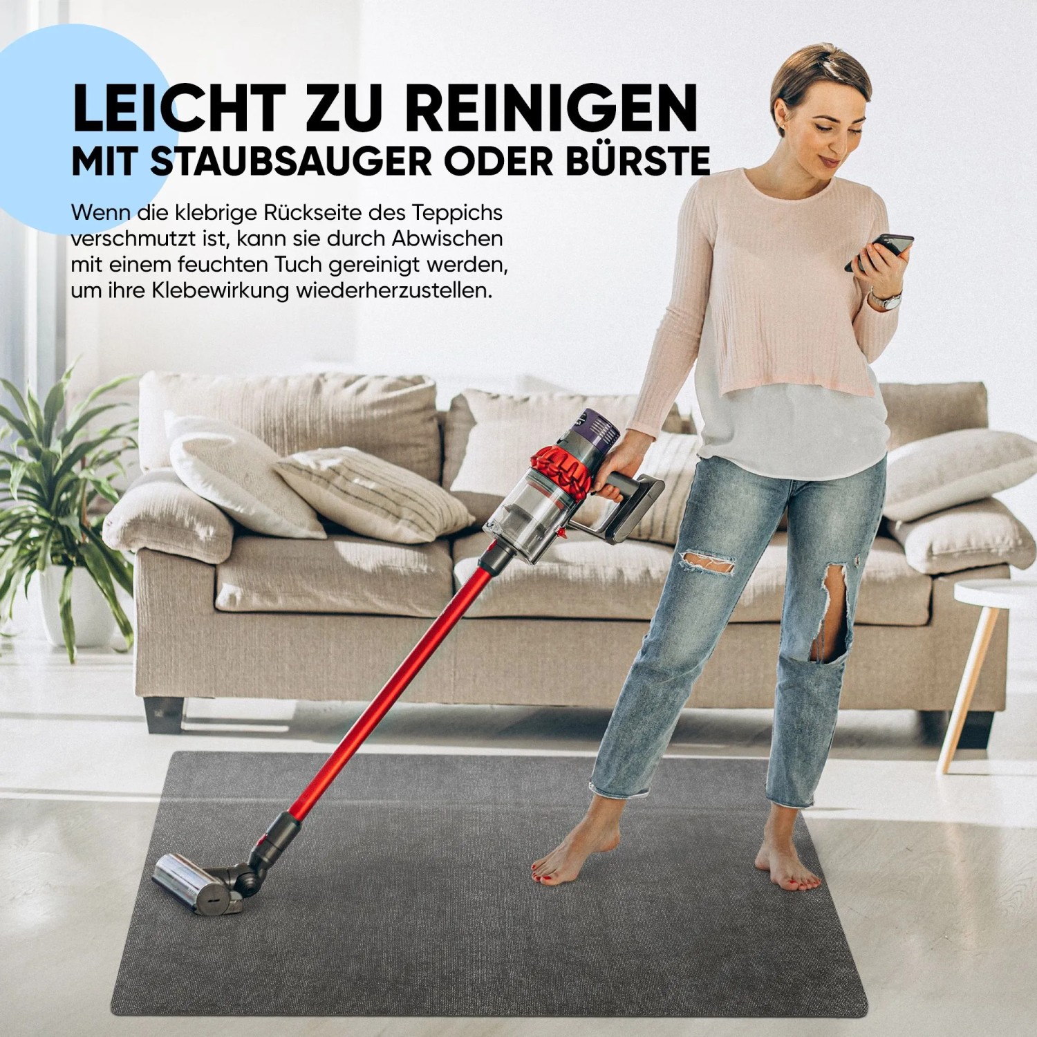 Graue Björn&Schiller Bodenschutzmatte unter Staubsauger. Kratzschutz für Böden.
