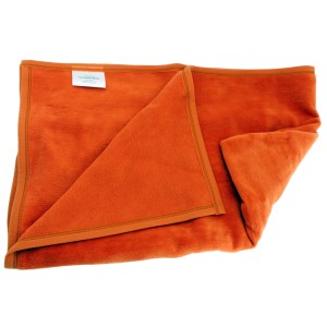 Terracottafarbene Heim Kuscheldecke, 100x140 cm, kochfest und mit Veloursbandeinfassung.
