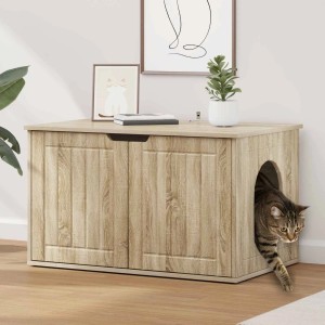 Modernes Katzenhaus Sonoma aus Holzwerkstoff mit runder Öffnung, aus der eine Katze tritt. Stilvolle Katzenmöbel.