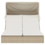 Beige Doppel-Sonnenliege mit Dach und Auflagen aus Poly Rattan.