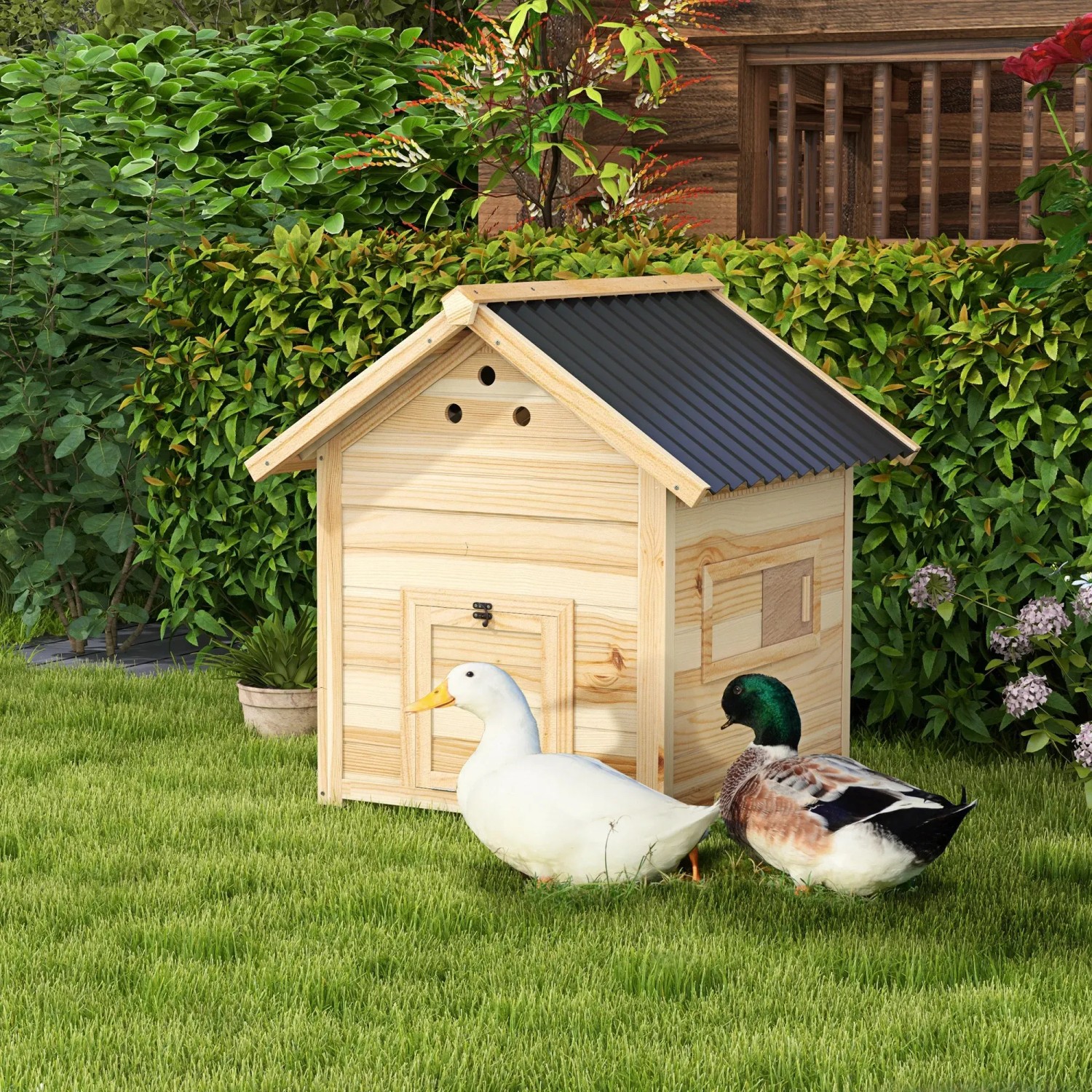 PawHut Entenstall aus Holz mit Kippdach und zwei Enten im Garten.