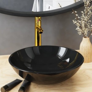 Schwarzes vidaXL Waschbecken mit goldenem Wasserhahn und Ablaufgarnitur.