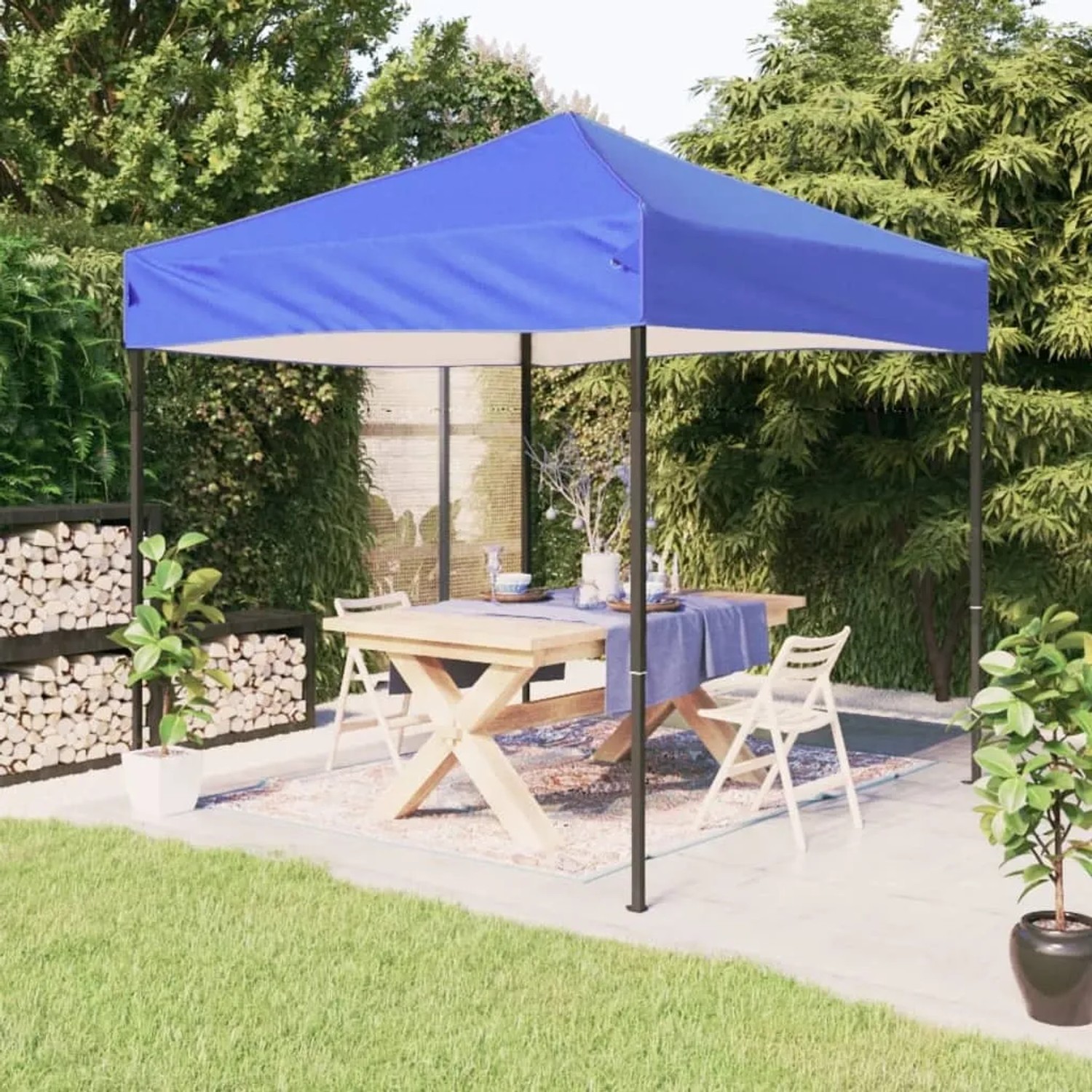 Blaues, faltbares Partyzelt 3x3 m von vidaXL im Garten mit Tisch und Stühlen.