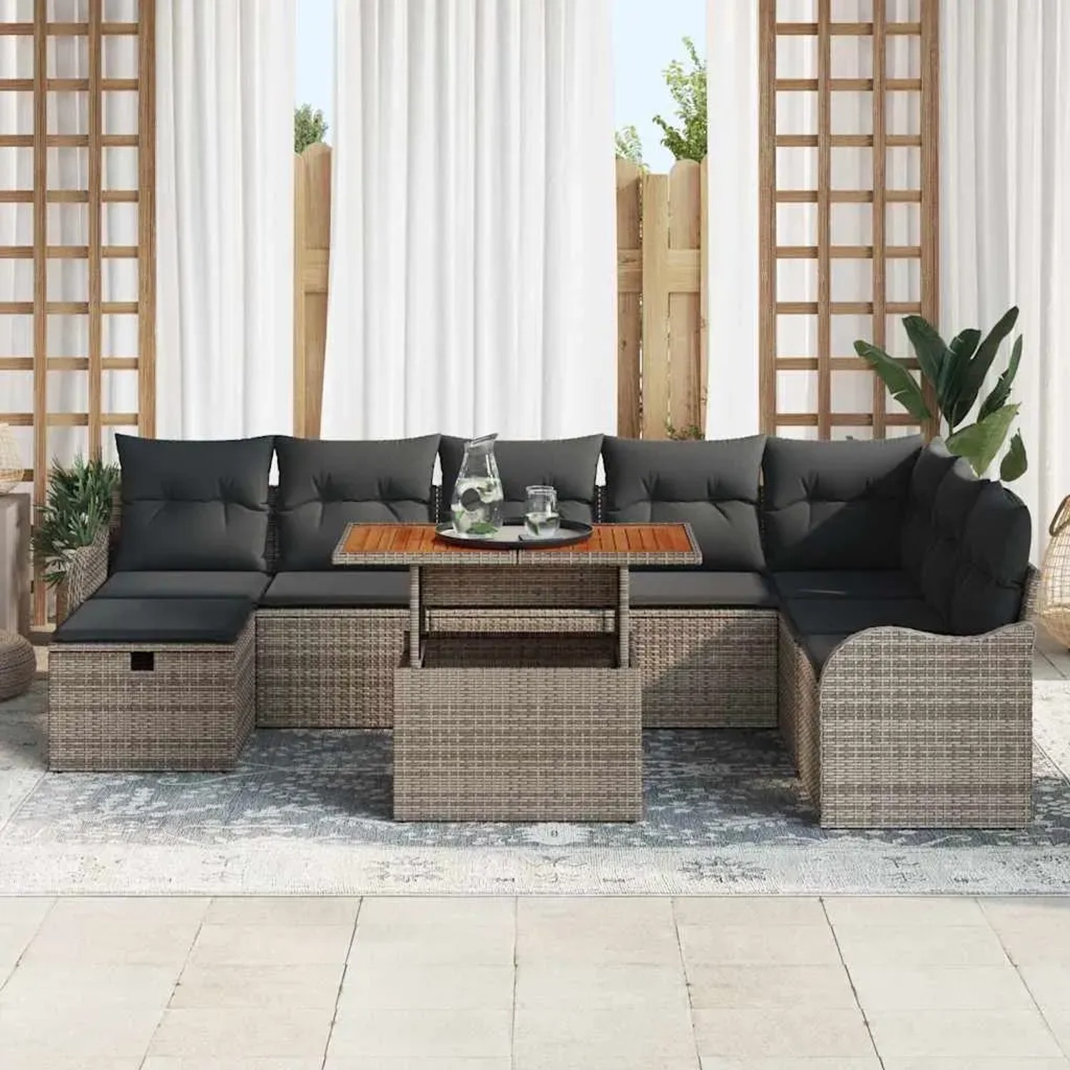 Graues 9-teiliges vidaXL Garten-Sofa-Set aus Poly Rattan mit Kissen und Stauraum.