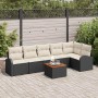 Schwarzes vidaXL Garten-Sofa-Set, 7-teilig, mit weißen Kissen und Tisch auf einer Terrasse.