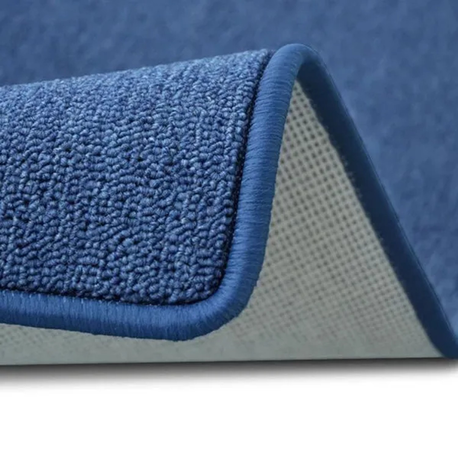 Detailansicht: Dunkelblauer Karat Teppichläufer London mit Schlingenflor und gekettelten Rand.