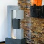 Moderner Gartenbrunnen XL Kaskade mit 3 Stufen, LED und Pumpe in Steinoptik.
