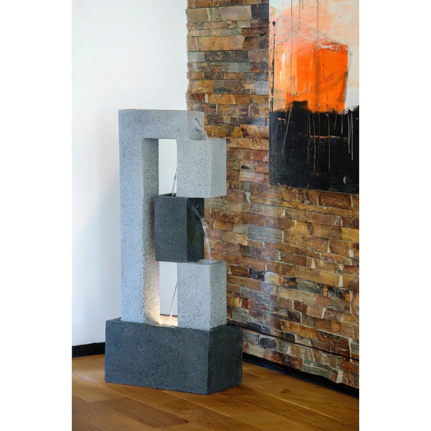 Moderner Gartenbrunnen XL Kaskade mit 3 Stufen, LED und Pumpe in Steinoptik.