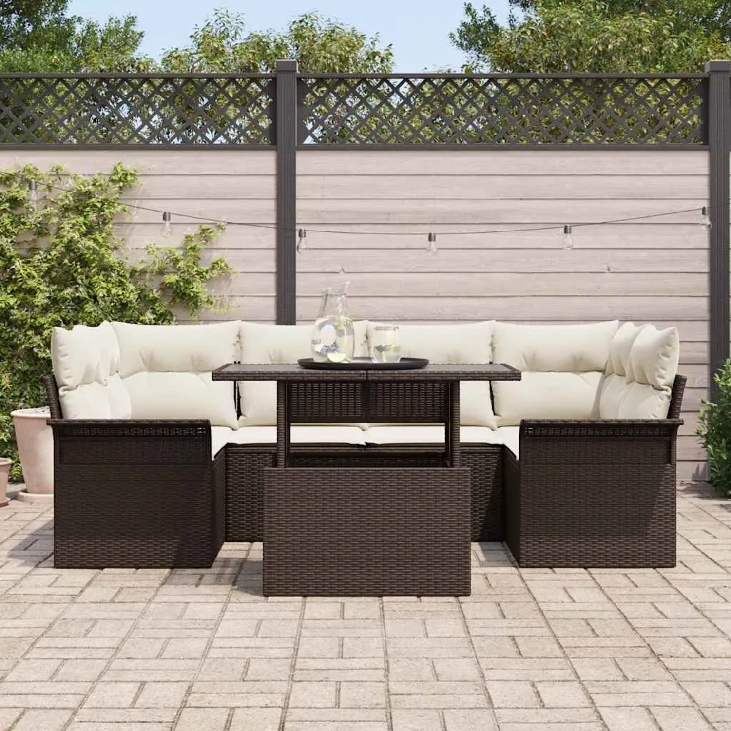 Braunes 7-teiliges vidaXL Garten-Sofa-Set aus Poly Rattan mit Kissen.