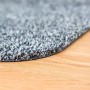 Detailaufnahme der anthrazitfarbenen Astra Sauberlaufmatte Entra (75x130cm) auf Holzboden.