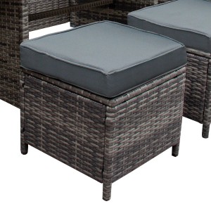 Detailaufnahme: Grauer Rattan Hocker mit Kissen, Teil der Monstershop Eckgarnitur.