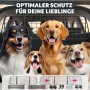 Tectake Hundeschutzgitter Balu aus Stahl, verstellbar, mit Hunden im Hintergrund.