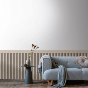 Wohnraum mit A.S. Creation Vliestapete Wallpanel in Grau-Schwarz mit Holzoptik.