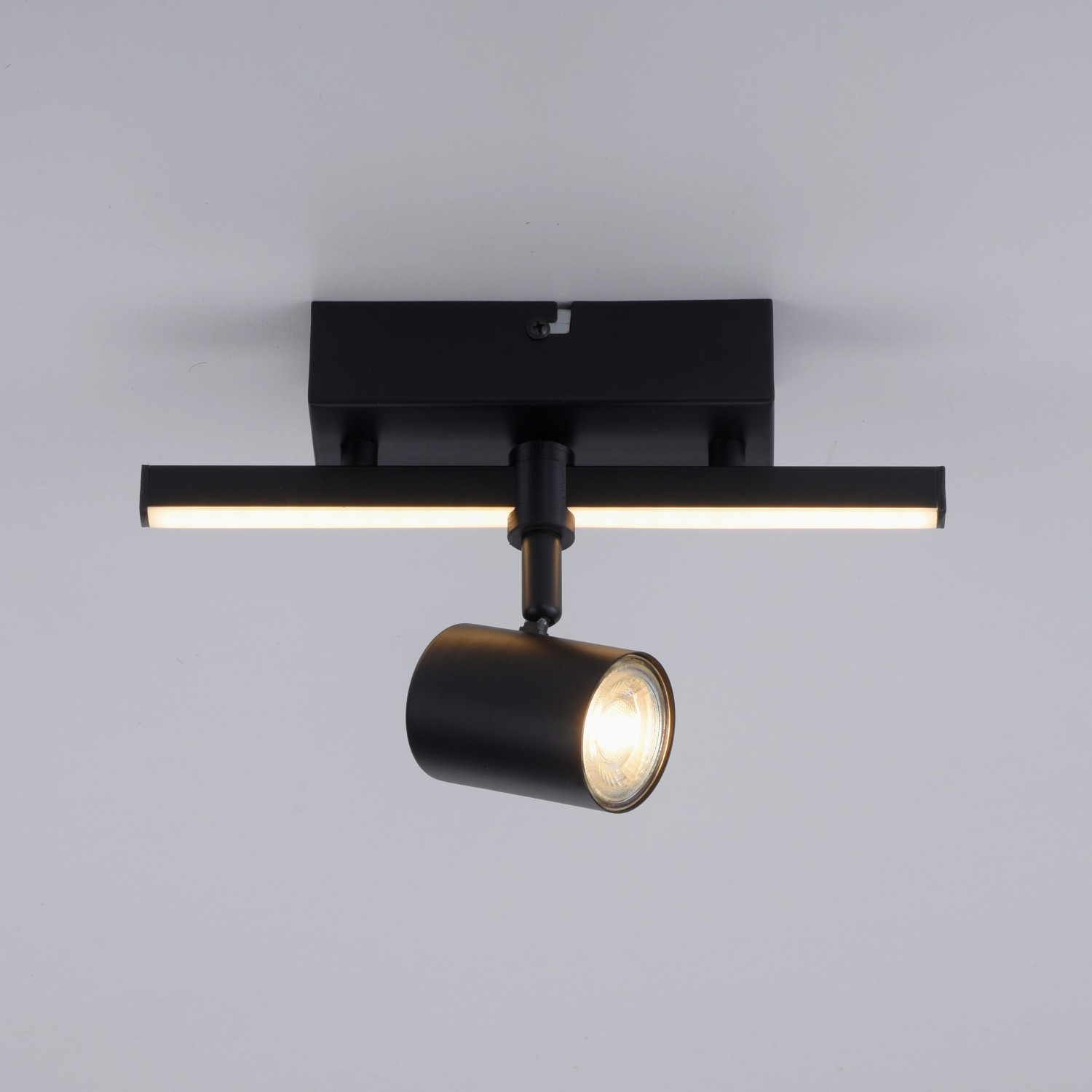 Schwarze LED-Wand- und Deckenleuchte Barik mit Spot und LED-Leiste.
