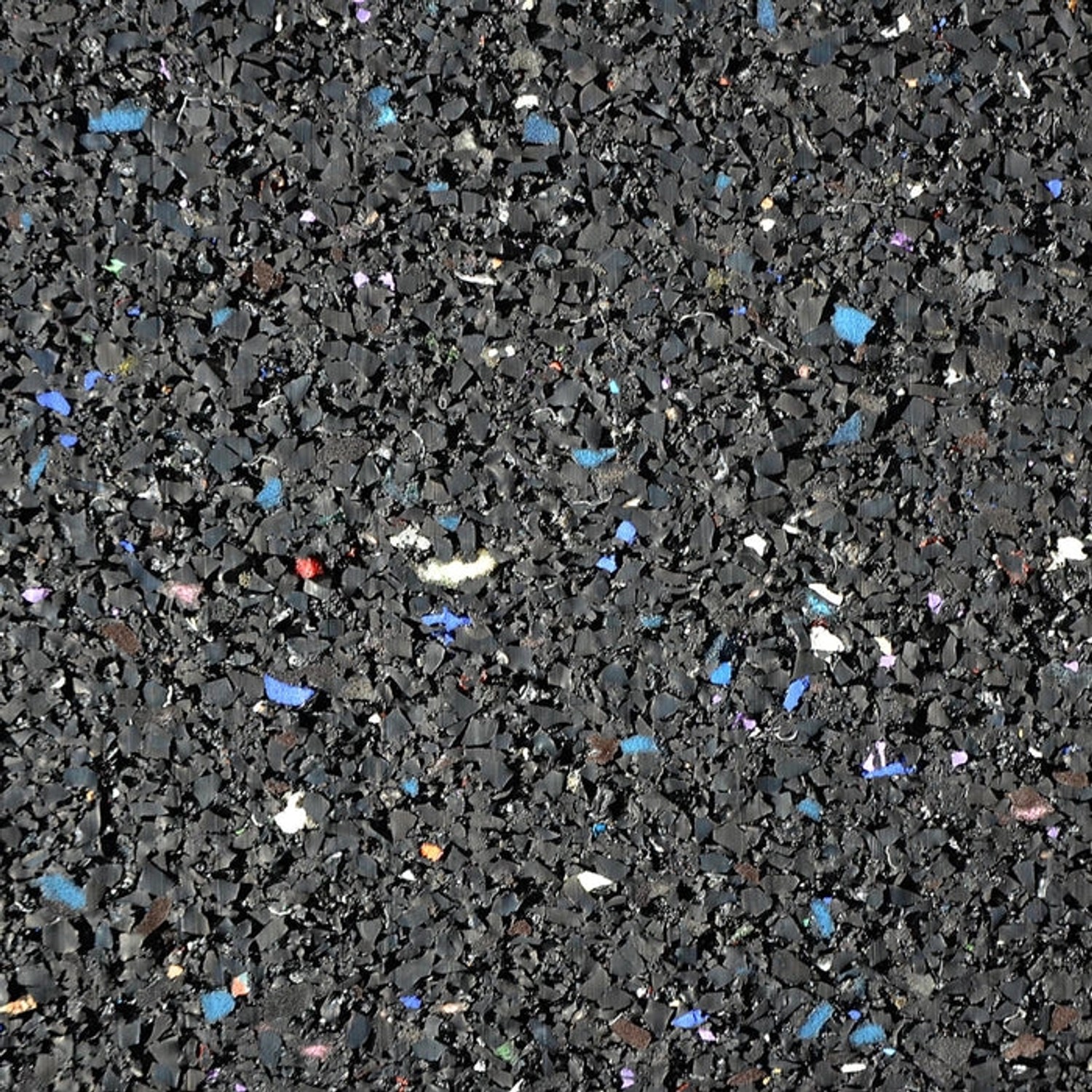 Detailansicht der schwarzen Karat Bautenschutzmatte aus Gummigranulat mit Farbpunkten.