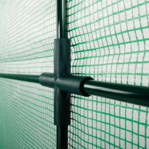 Detailaufnahme des Stahlrahmens und der grünen Folie des KARAT Gewächshauses Botanika.