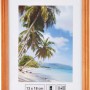 Holzbilderrahmen Erle gerillt, 13x18 cm, mit Foto einer tropischen Szene.