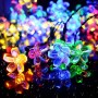 Bunte LED Solar-Lichterkette mit leuchtenden Kirschblüten, wasserfest, für stimmungsvolle Beleuchtung.