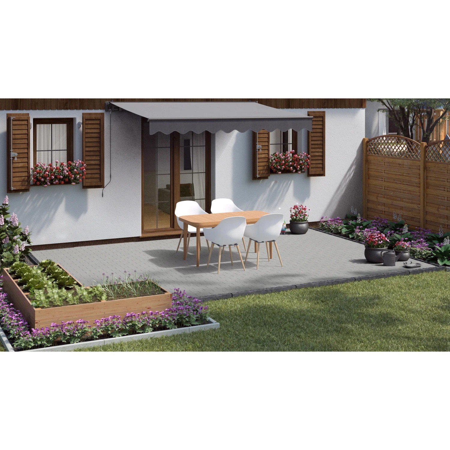 Verlegte graue Rechteck-Pflastersteine (20x10x8 cm) auf einer Terrasse mit Gartenmöbeln.